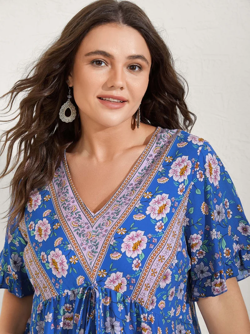 Asymmetrical Floral Print V-Neck Blouse