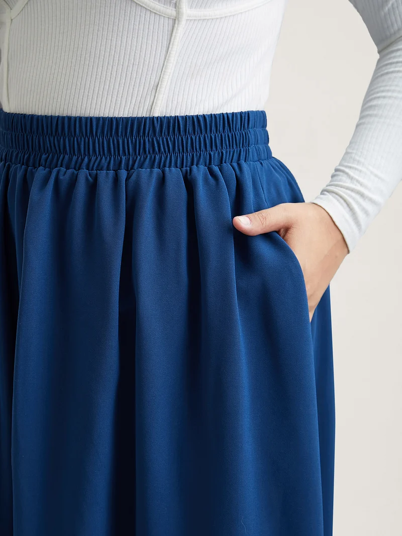 Asymmetrical Hem Stretchy-Waist Plain Midi Skirt