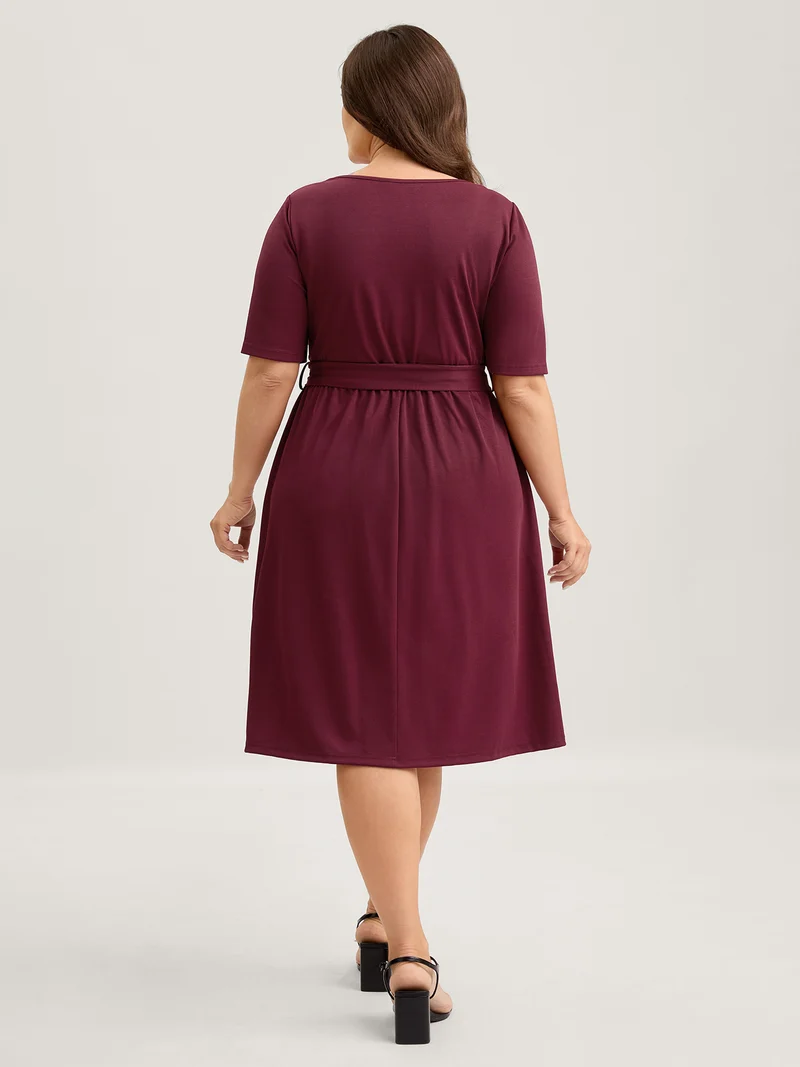Stretchy Overlap Bodice Pockets Knit Midi Dress