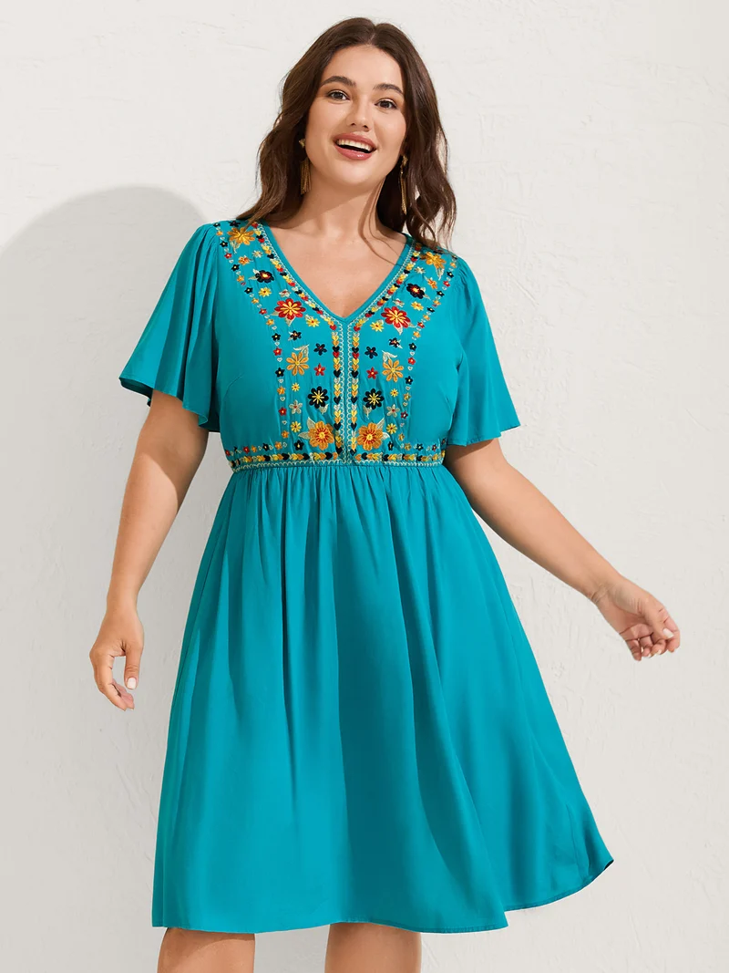 Rayon Floral Embroidered Pockets Midi Dress