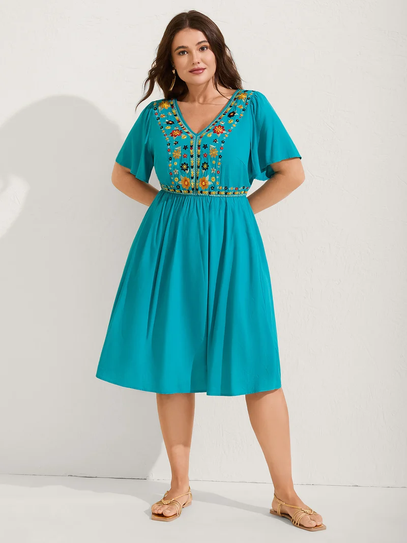 Rayon Floral Embroidered Pockets Midi Dress