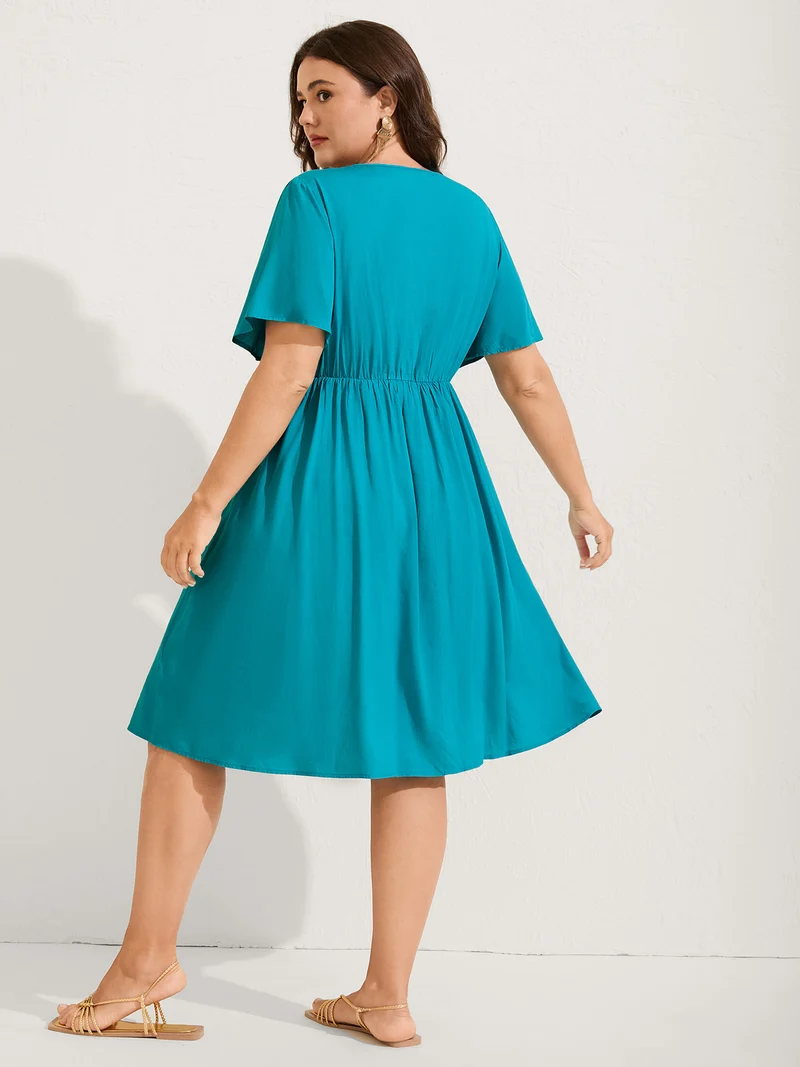 Rayon Floral Embroidered Pockets Midi Dress