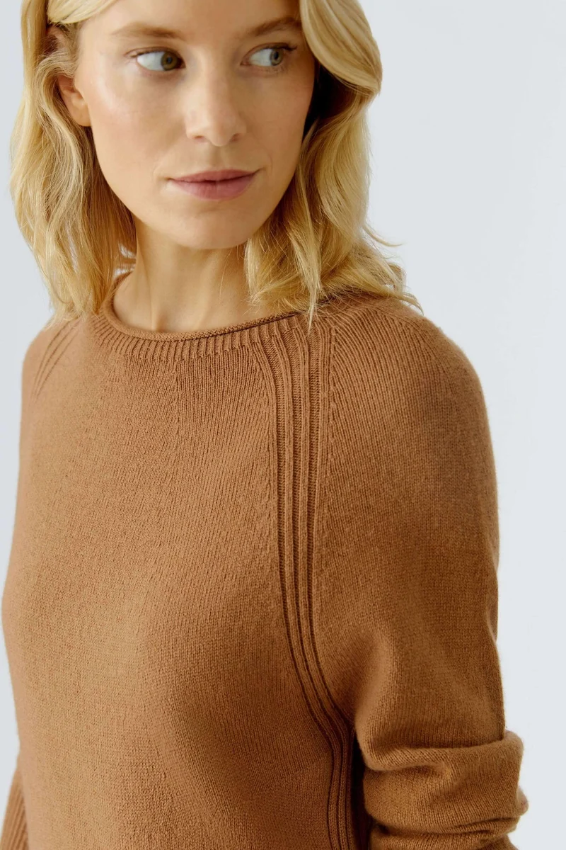Robe tricotée à manches longues et poches plaquées