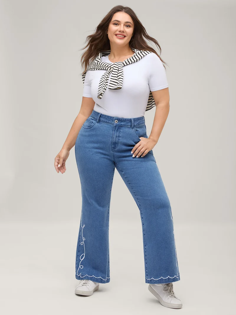 Wavy Embroidered Hem Mid Rise Jeans