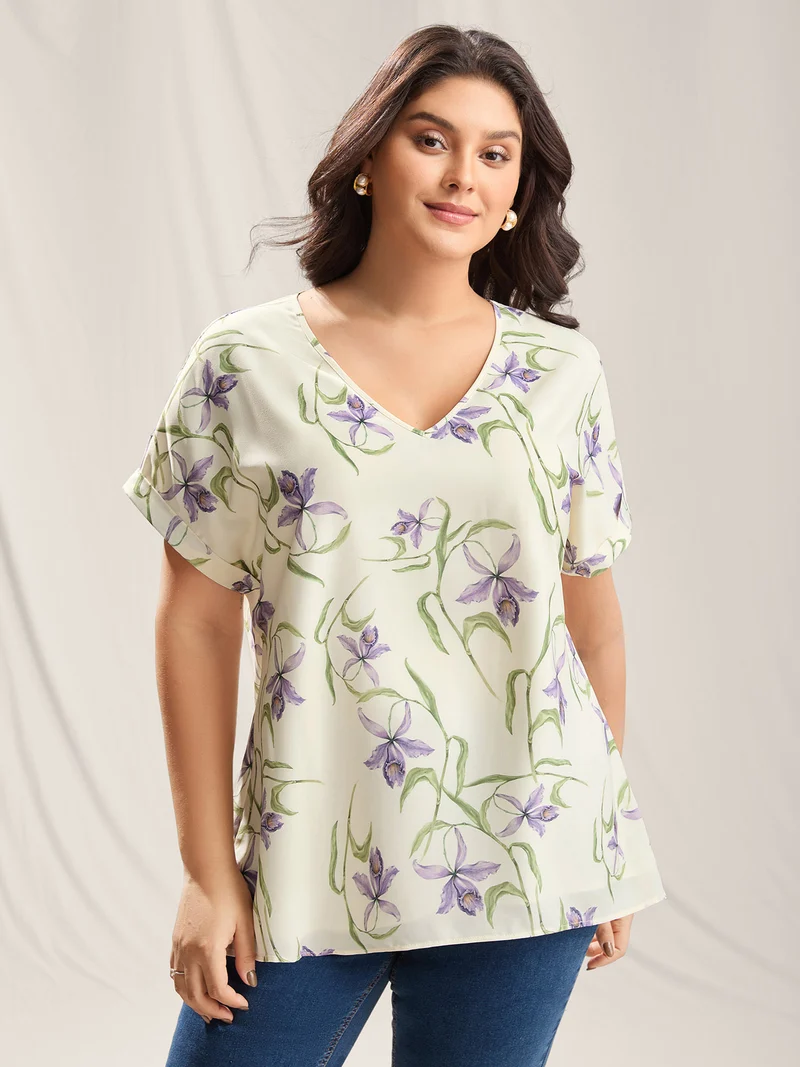 Large Flower Print Curved Hem Blouse