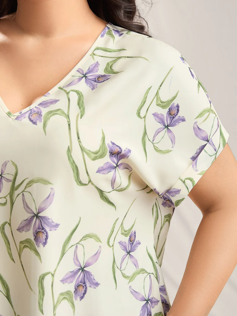 Large Flower Print Curved Hem Blouse