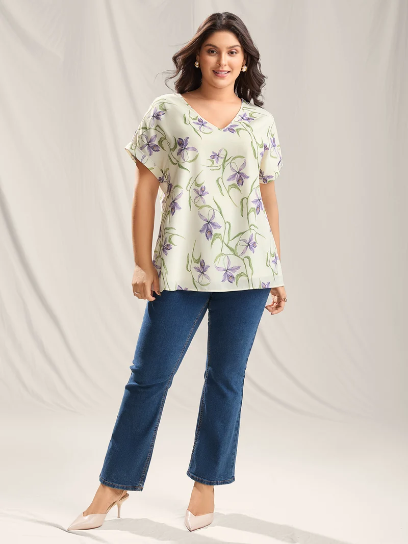 Large Flower Print Curved Hem Blouse