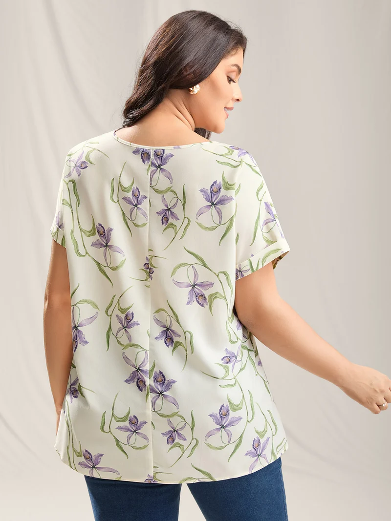Large Flower Print Curved Hem Blouse