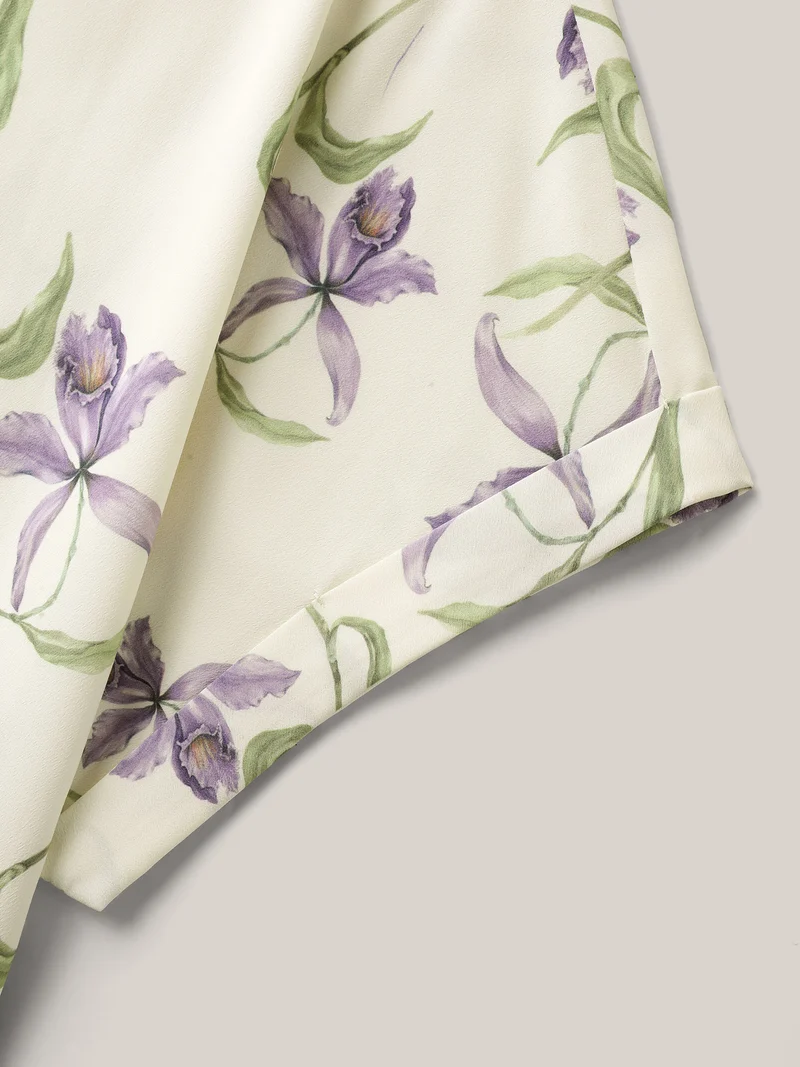 Large Flower Print Curved Hem Blouse