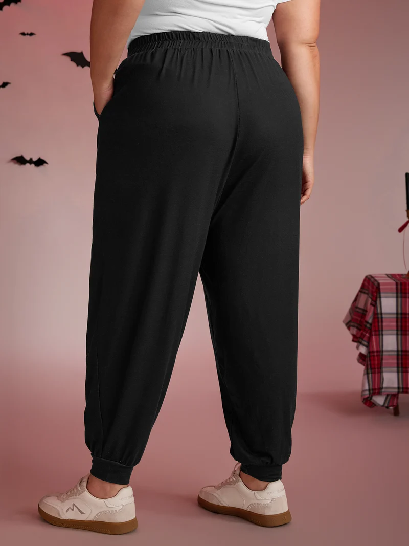 Half Skeleton Halloween Print Jogger Pants