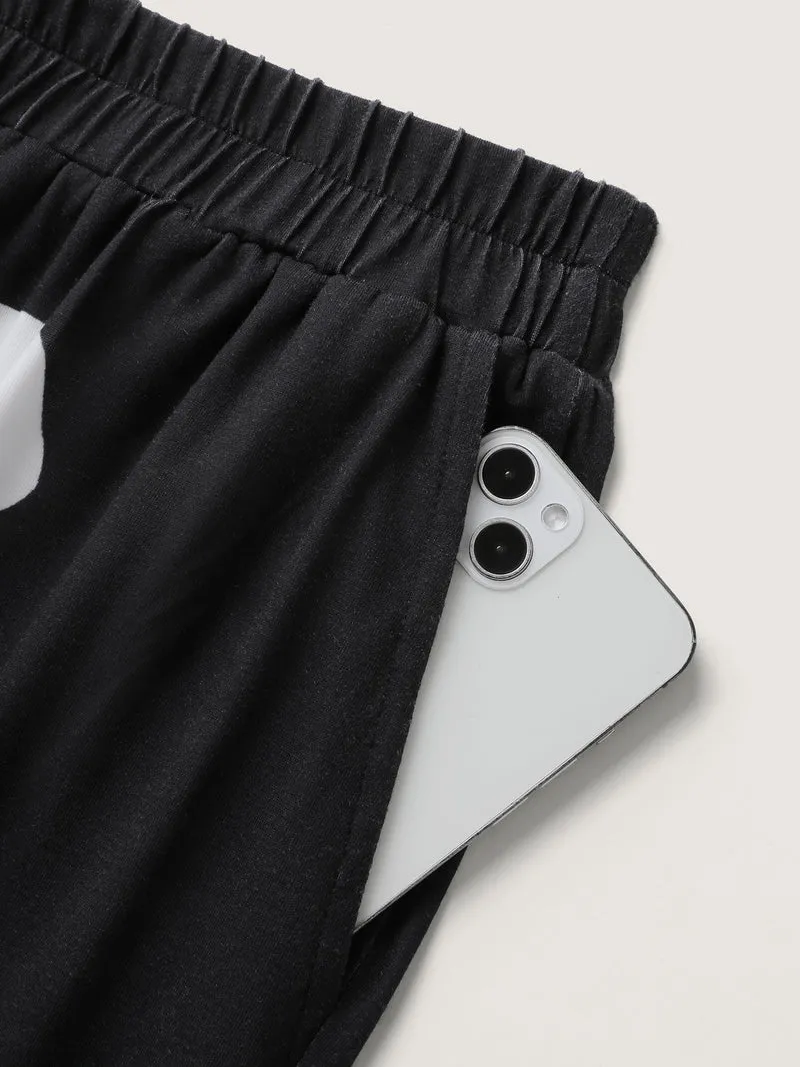 Half Skeleton Halloween Print Jogger Pants