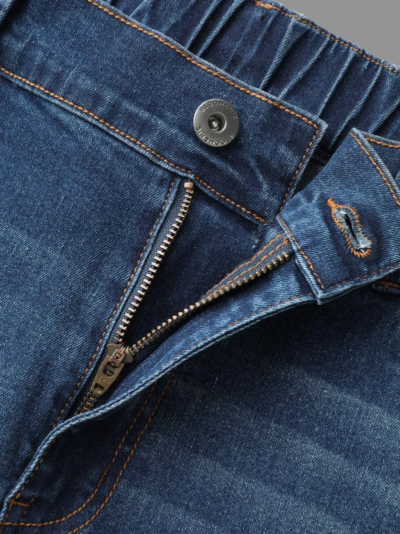 Dark Wash Elastic Waist Flared Mid Rise Jeans