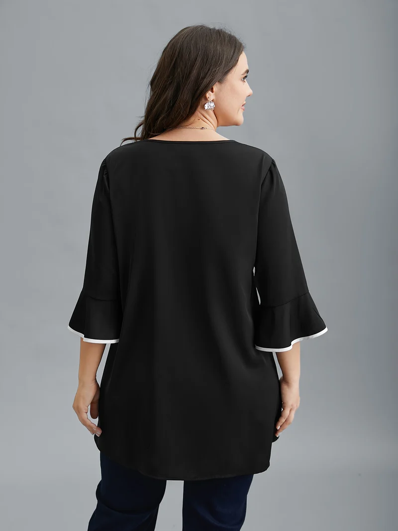Color-Block Spliced Ruffled Overlap Hem Blouse