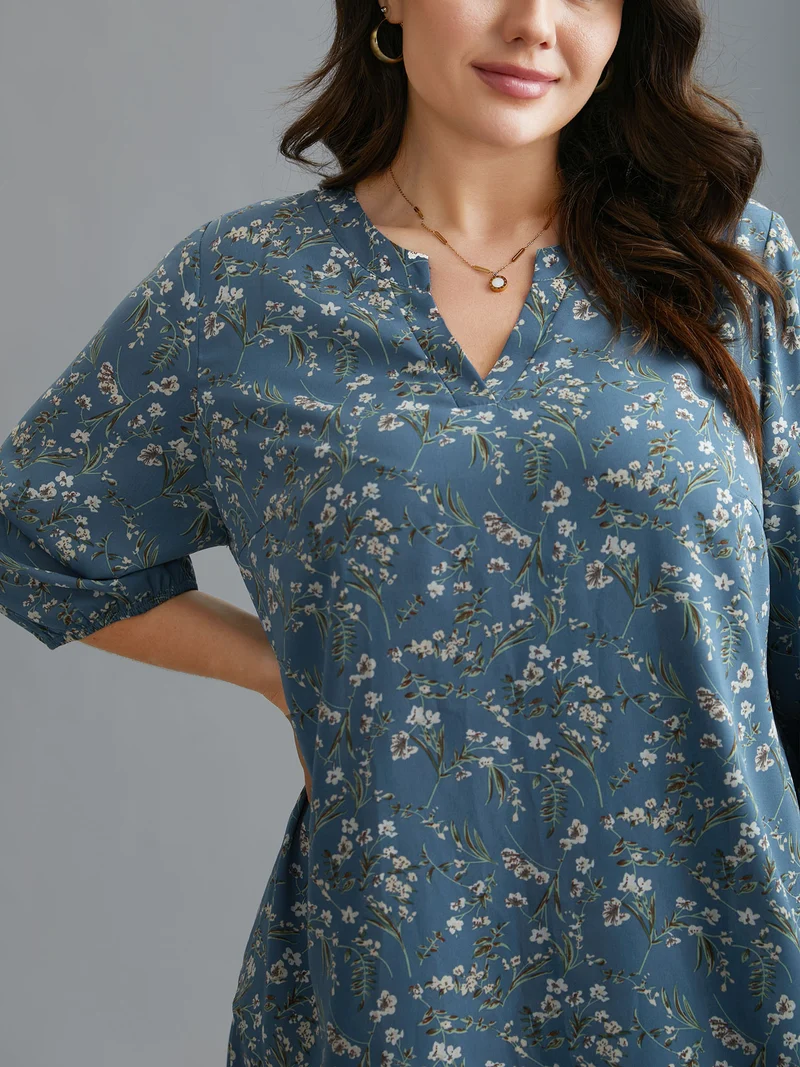 Floral Asymmetrical Hem Elastic Cuff Blouse