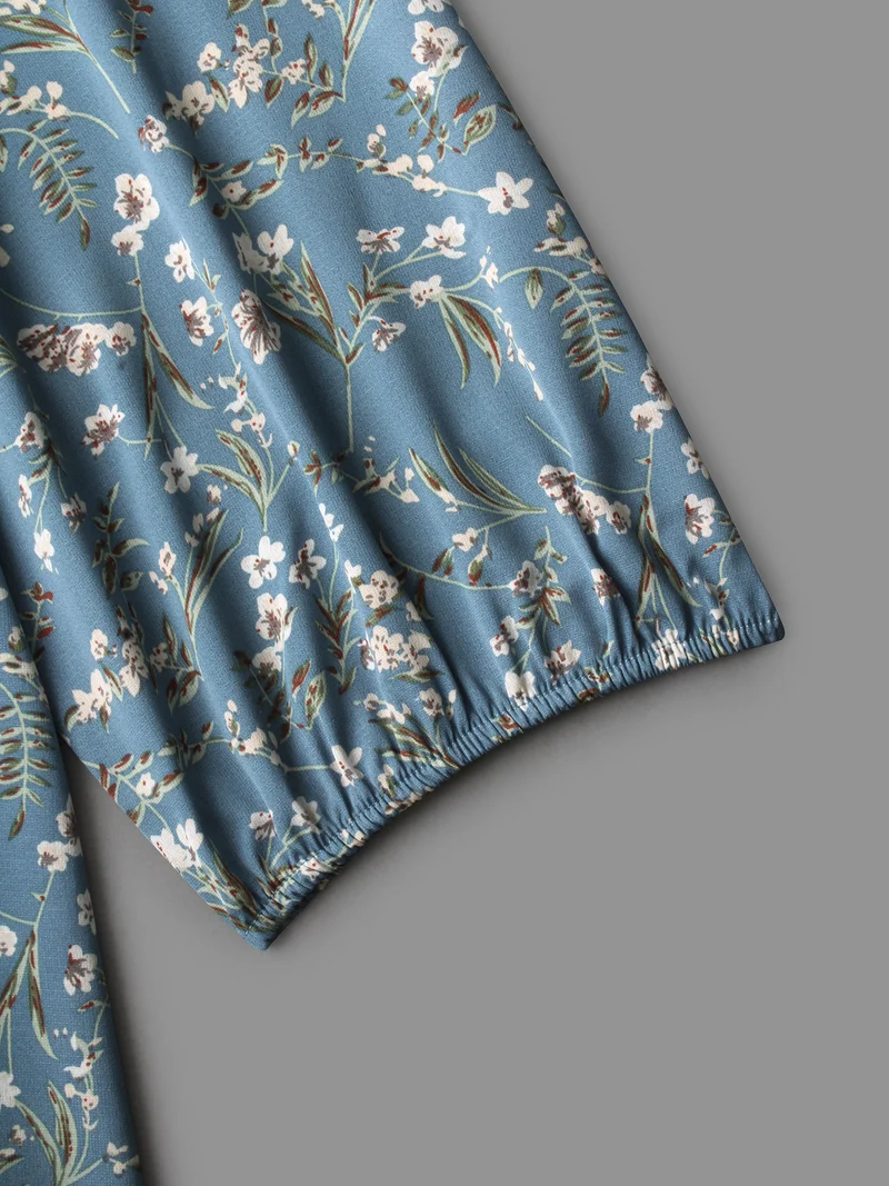 Floral Asymmetrical Hem Elastic Cuff Blouse