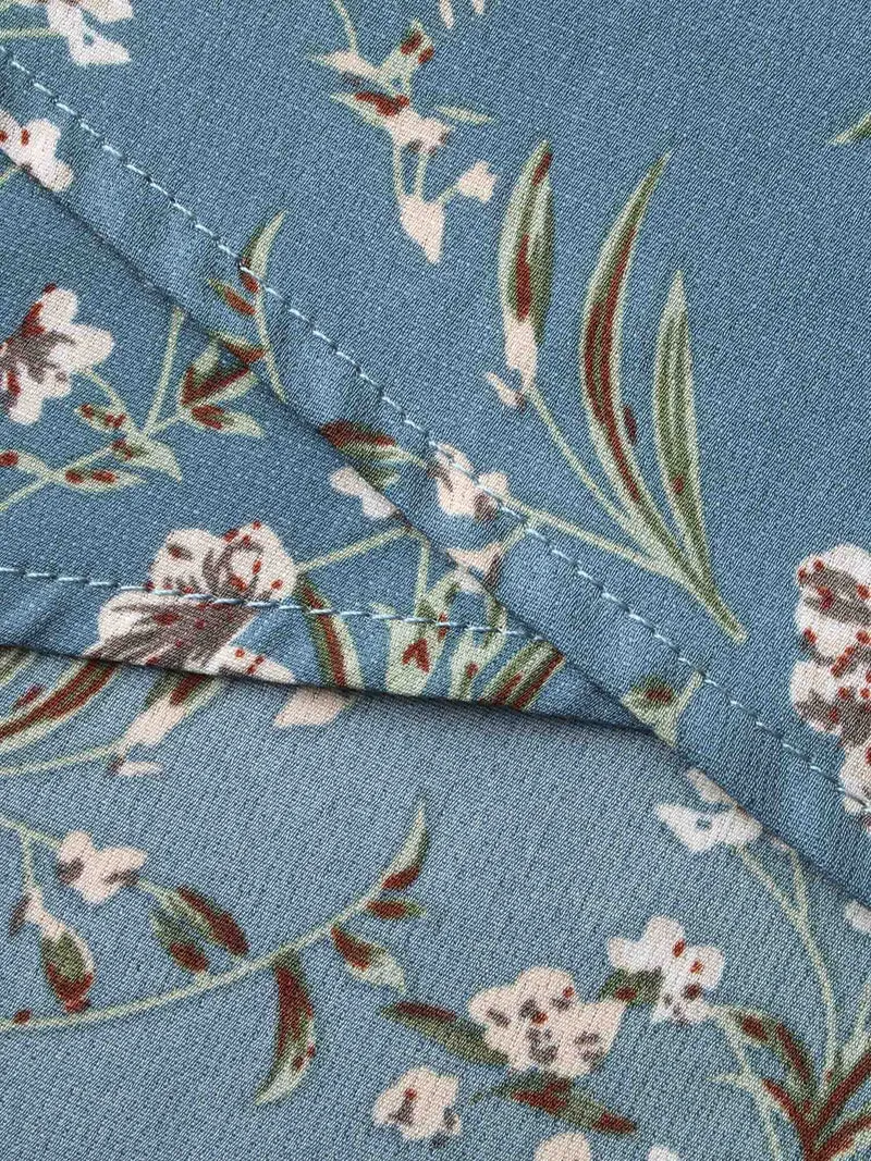 Floral Asymmetrical Hem Elastic Cuff Blouse