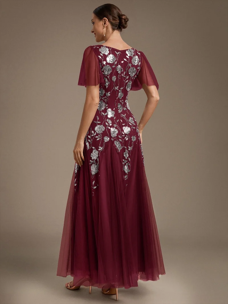ever ORLA|Robe longue à manches courtes en sequins avec volants et décolleté en V