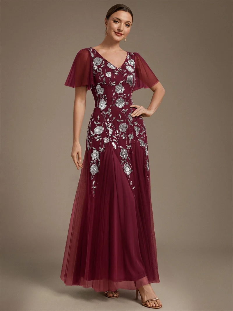 ever ORLA|Robe longue à manches courtes en sequins avec volants et décolleté en V