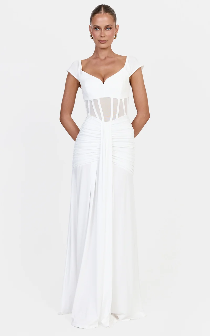 Luciana Maxi Dress - Sheer Corset Bodice Dress With Cap Sleeves And Hip Drape Details in White