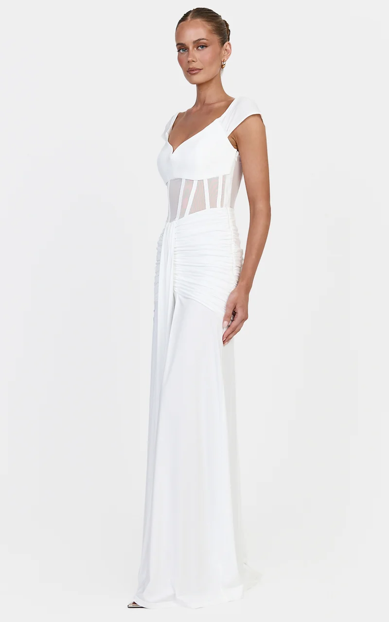 Luciana Maxi Dress - Sheer Corset Bodice Dress With Cap Sleeves And Hip Drape Details in White