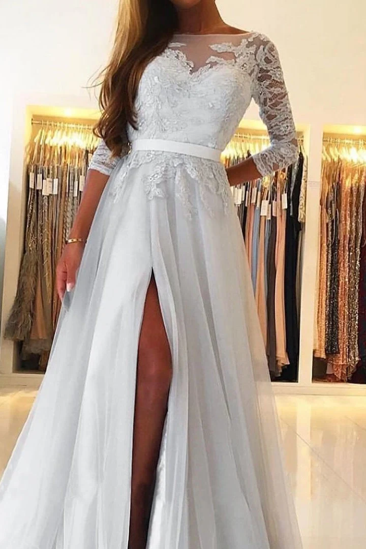 Robe de bal élégante à manches longues et coupe trapèze en dentelle avec fente sur la cuisse