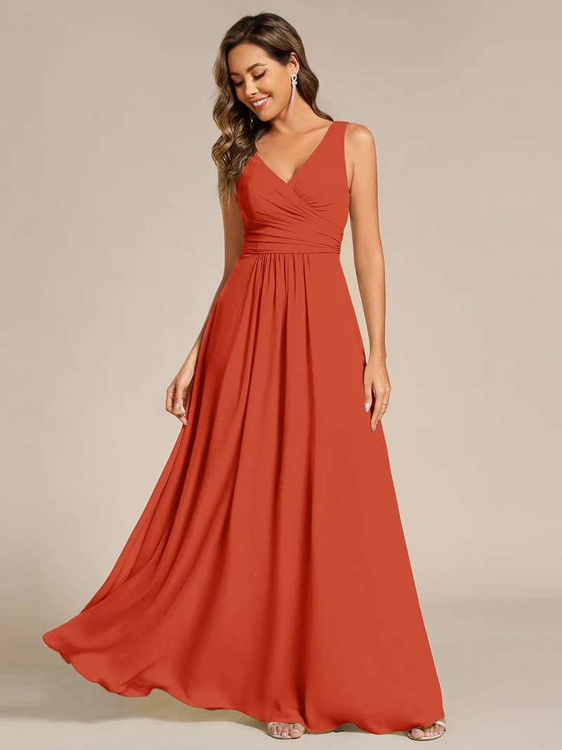 Robe de soirée longue en mousseline plissée sans bretelles à col en V
