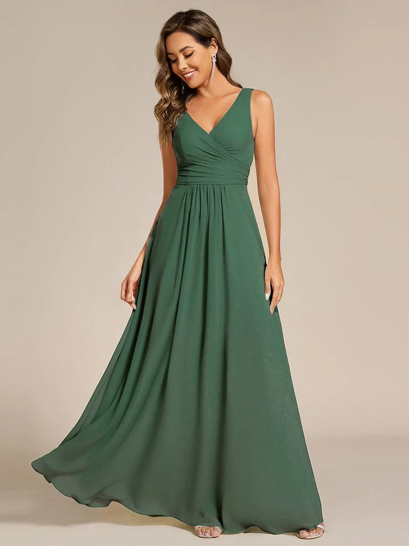 Robe de soirée longue en mousseline plissée sans bretelles à col en V