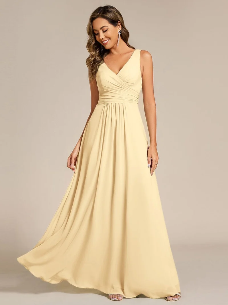 Robe de soirée longue en mousseline plissée sans bretelles à col en V
