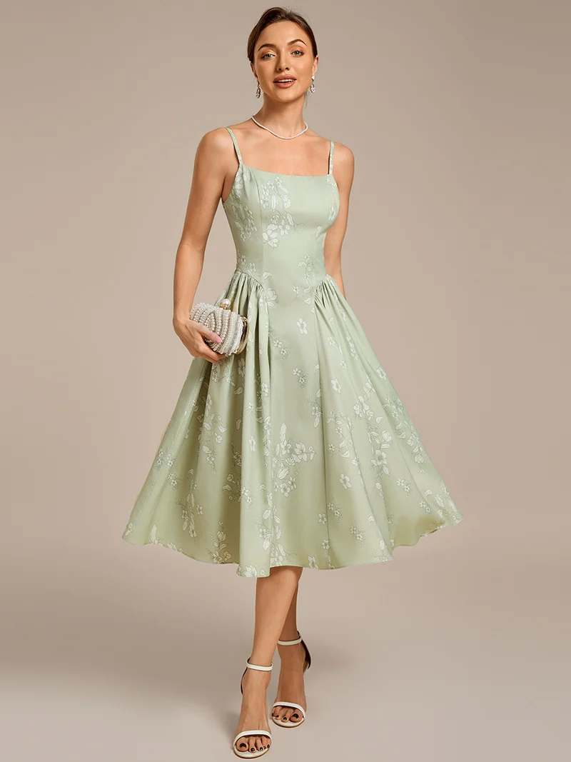 Robe de mariée à fleurs et bretelles spaghetti
