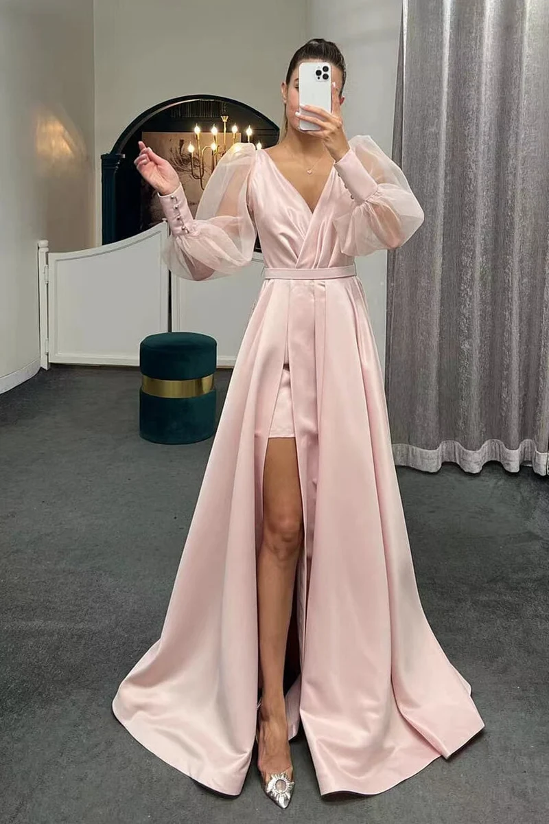 Robe de soirée élégante à manches longues bouffantes et coupe trapèze avec fente sur la cuisse