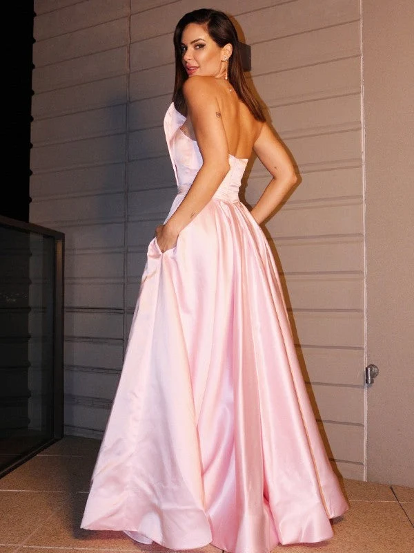 Robe de bal longue rose à une épaule avec fente et poches