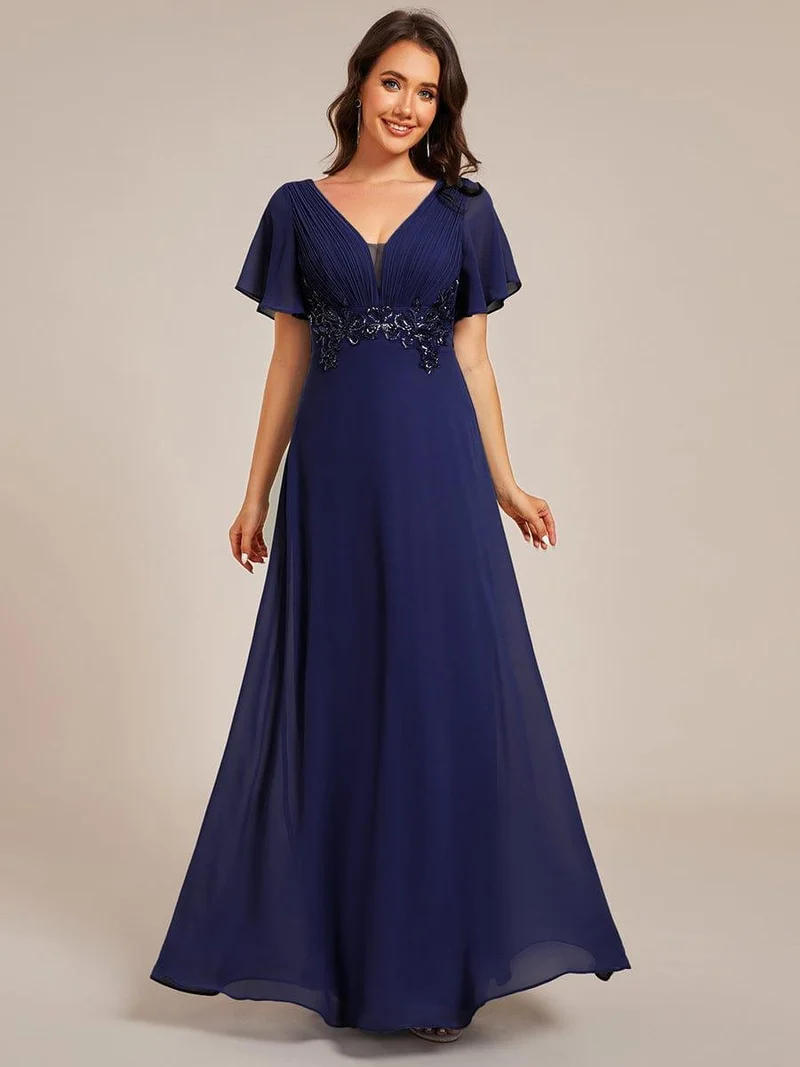 Robe de soirée longue à col en V et appliques à la taille grande taille