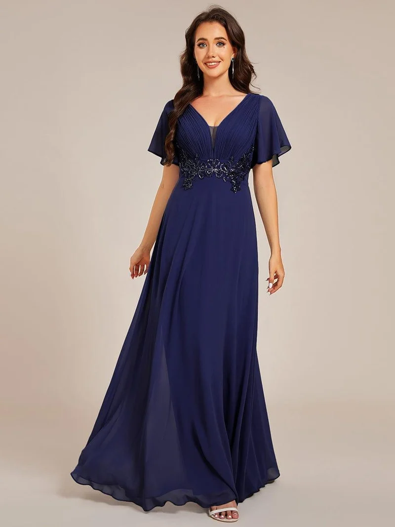 Robe de soirée longue plissée élégante à col en V profond