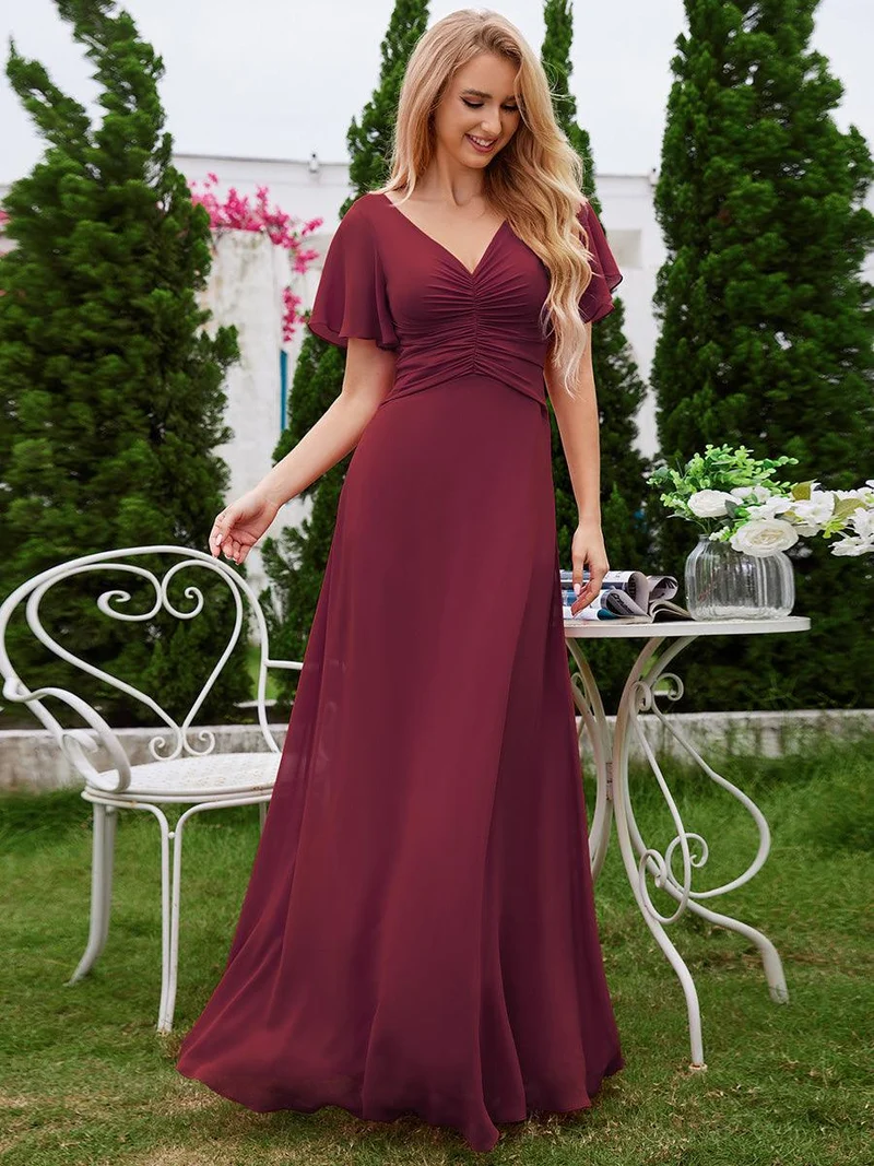 Robe de demoiselle d'honneur trapèze en mousseline à manches volantées avec plis à col en V