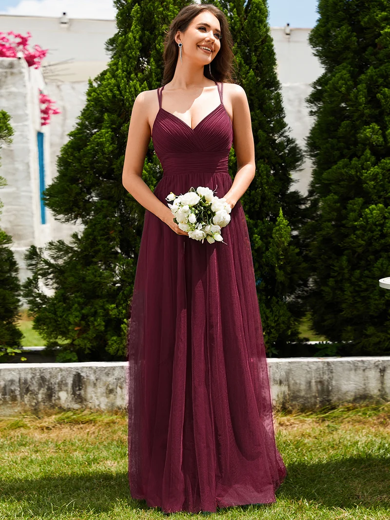 Robe de demoiselle d'honneur en tulle plissée sans manches à col en V et bretelles croisées au dos en dentelle