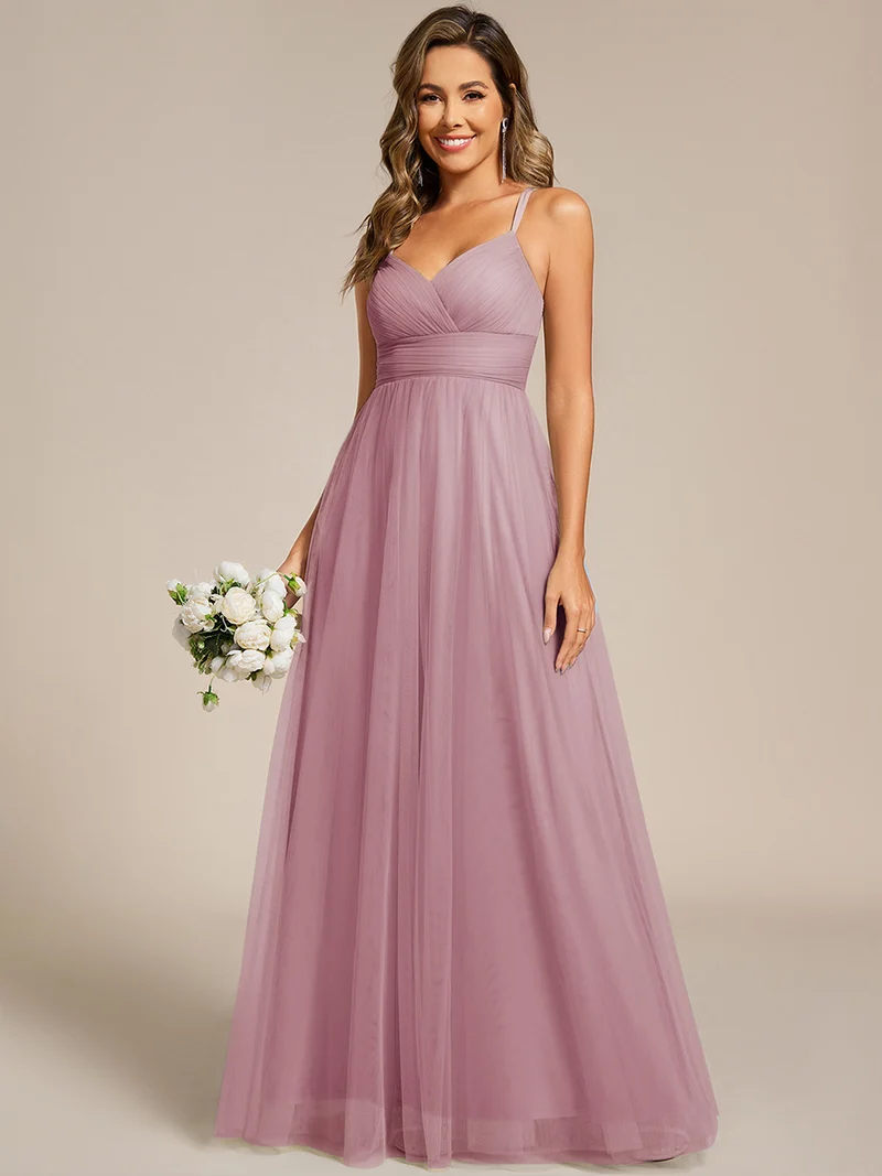 Robe de demoiselle d'honneur en tulle plissée sans manches à col en V et bretelles croisées au dos en dentelle