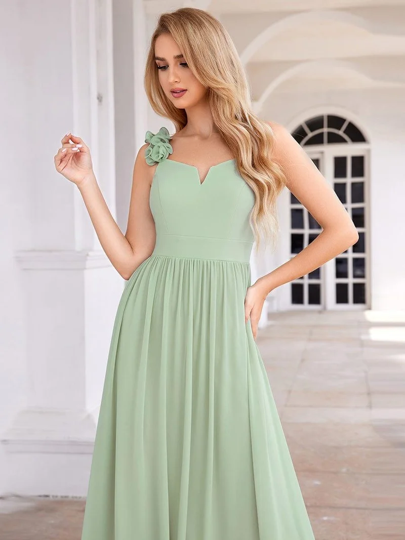 Robe de demoiselle d'honneur élégante en mousseline de soie col en V bretelles florales taille empire