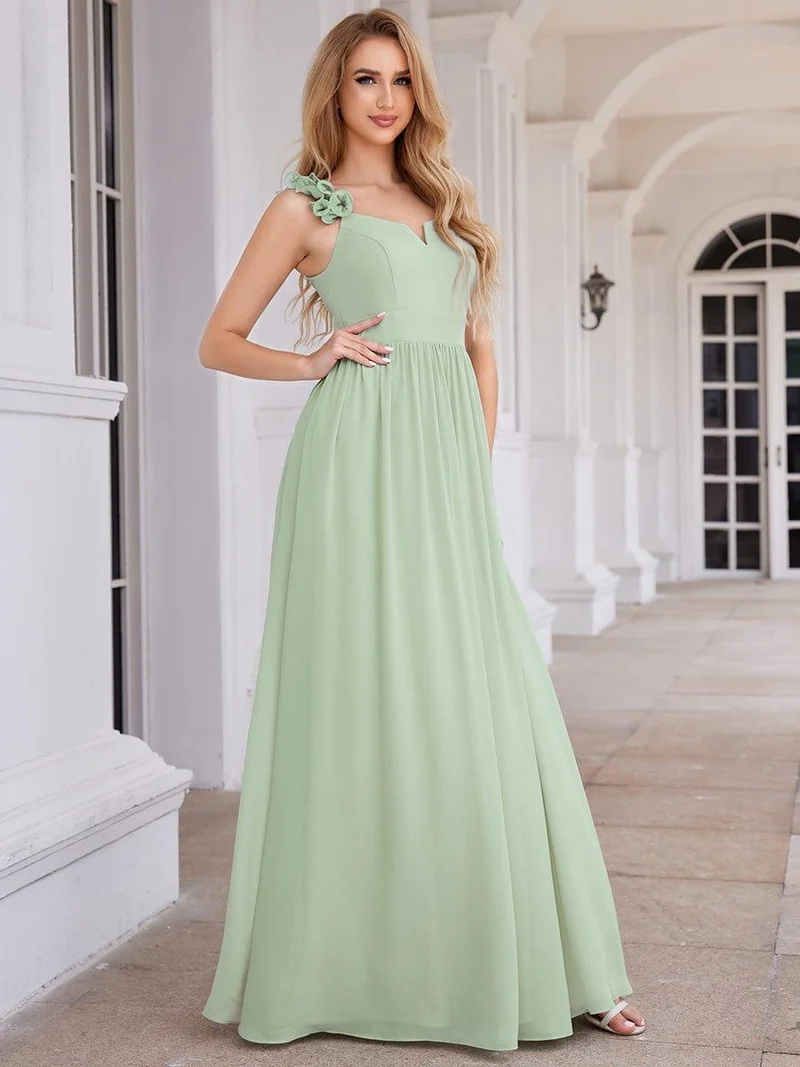 Robe de demoiselle d'honneur élégante en mousseline de soie col en V bretelles florales taille empire