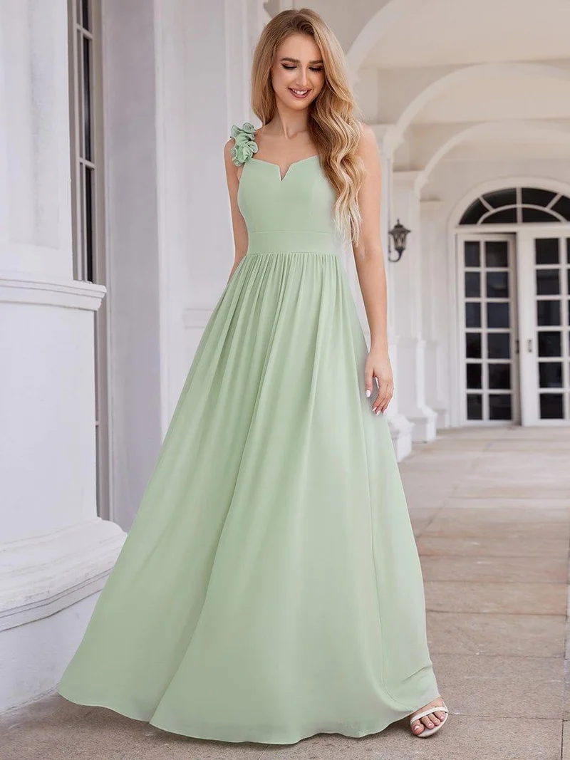 Robe de demoiselle d'honneur élégante en mousseline de soie col en V bretelles florales taille empire