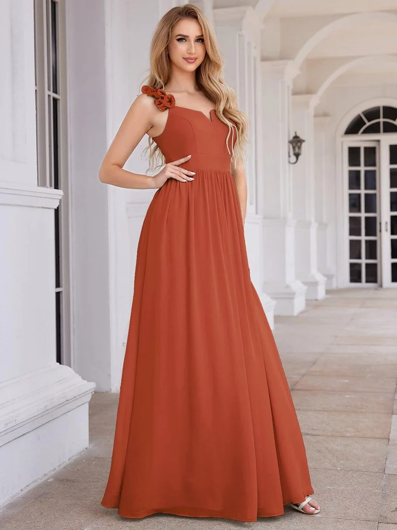 Robe de demoiselle d'honneur élégante en mousseline de soie col en V bretelles florales taille empire