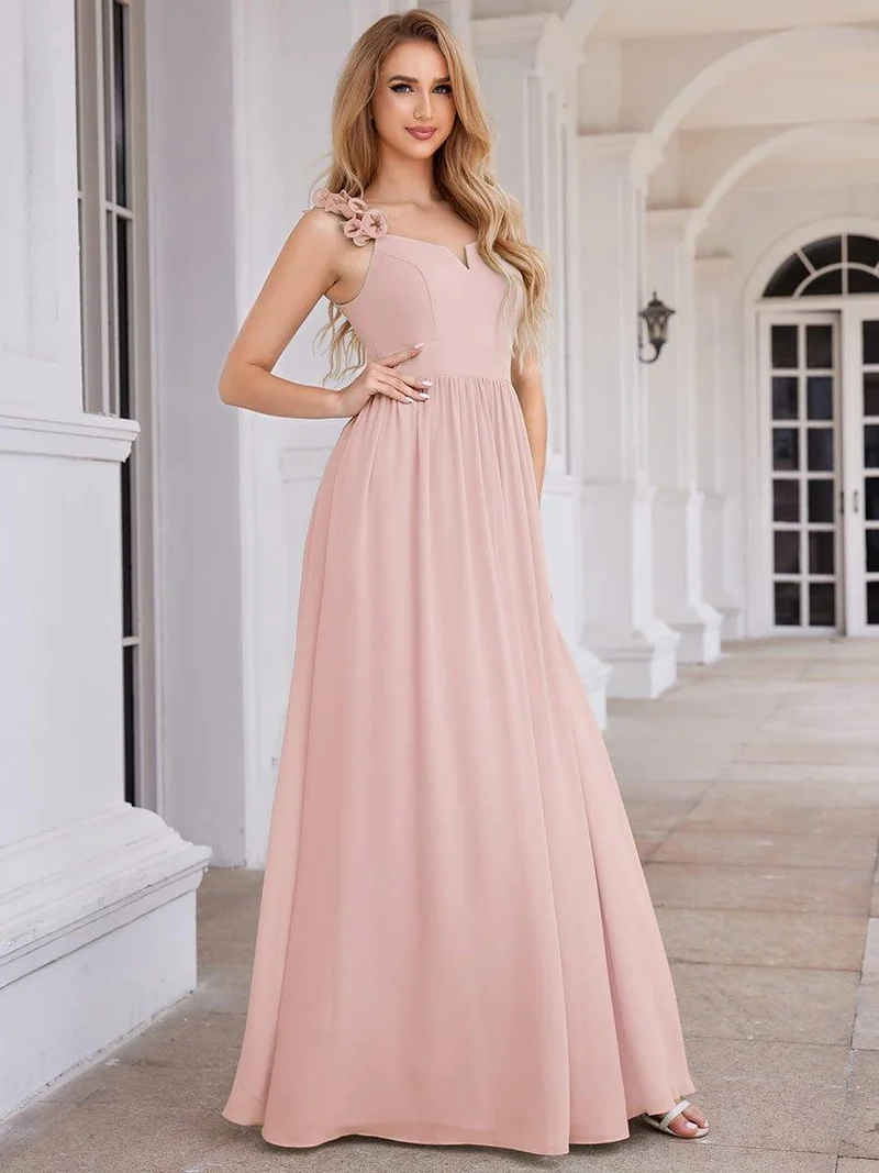 Robe de demoiselle d'honneur élégante en mousseline de soie col en V bretelles florales taille empire
