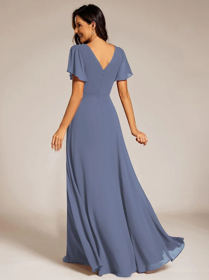 Robe de soirée plissée trapèze en mousseline de soie manches courtes et taille à sequins
