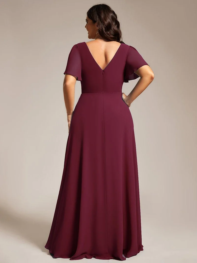 Robe de soirée plissée trapèze en mousseline de soie manches courtes et taille à sequins