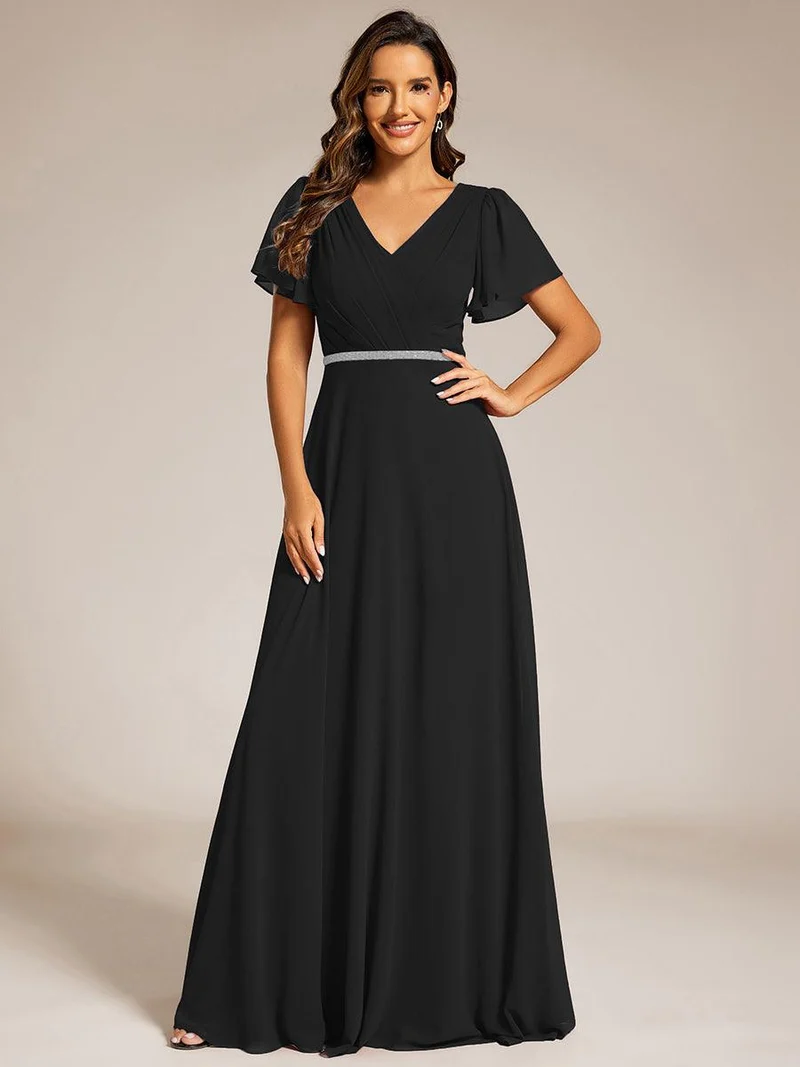 Robe de soirée plissée trapèze en mousseline de soie manches courtes et taille à sequins