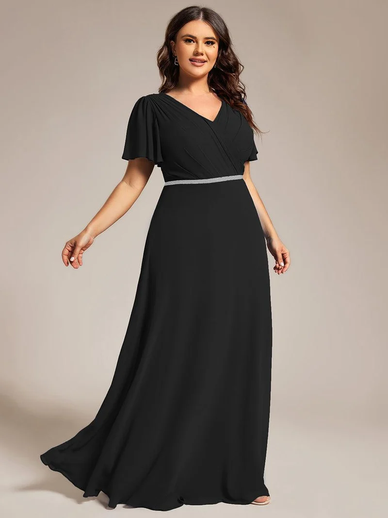 Robe de soirée plissée trapèze en mousseline de soie manches courtes et taille à sequins