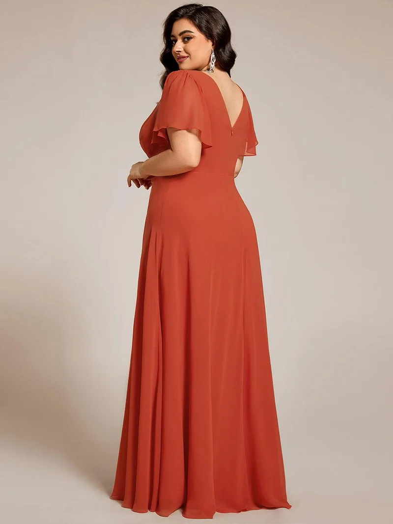 Robe de soirée plissée trapèze en mousseline de soie manches courtes et taille à sequins