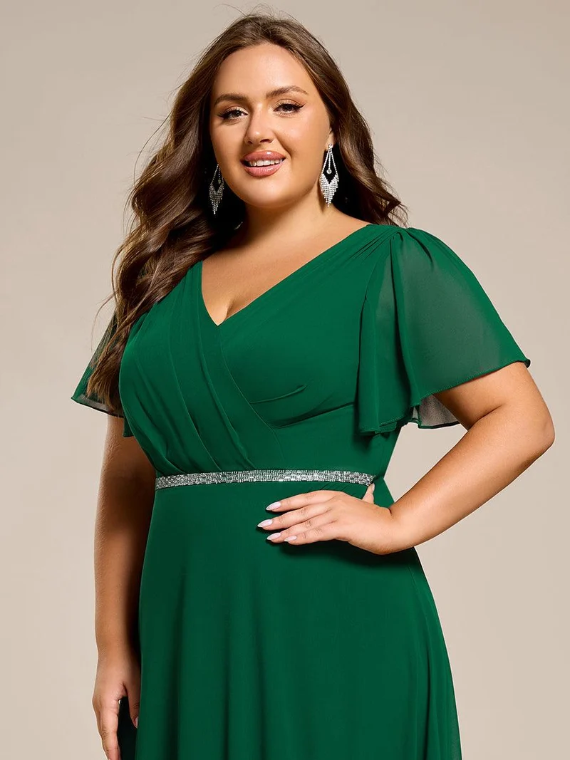 Robe de soirée plissée trapèze en mousseline de soie manches courtes et taille à sequins