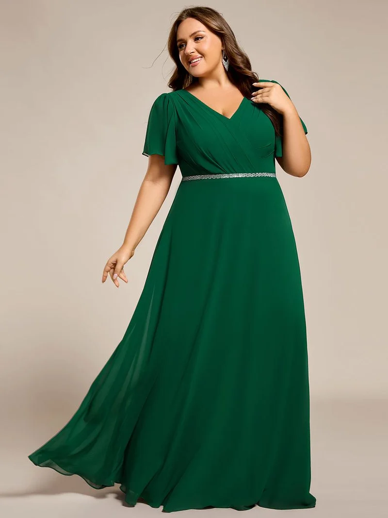 Robe de soirée plissée trapèze en mousseline de soie manches courtes et taille à sequins
