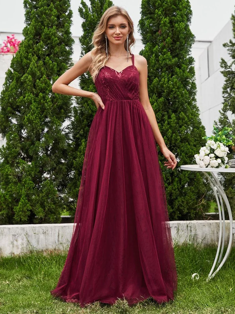Robe de demoiselle d'honneur sans manches en tulle pailleté avec bretelles croisées dans le dos