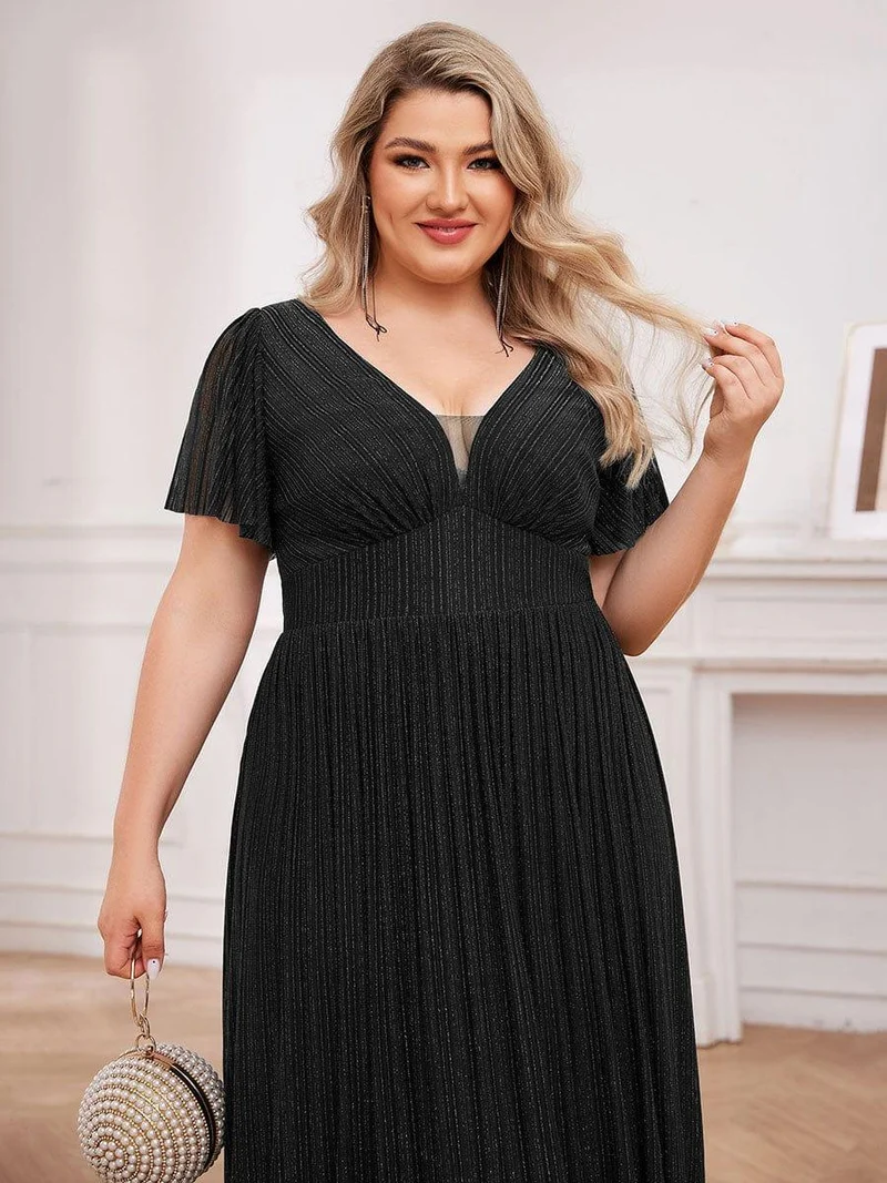 Robe de soirée transparente scintillante col en V taille empire manches courtes